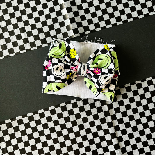 Checkered Neon Smiley's Bow